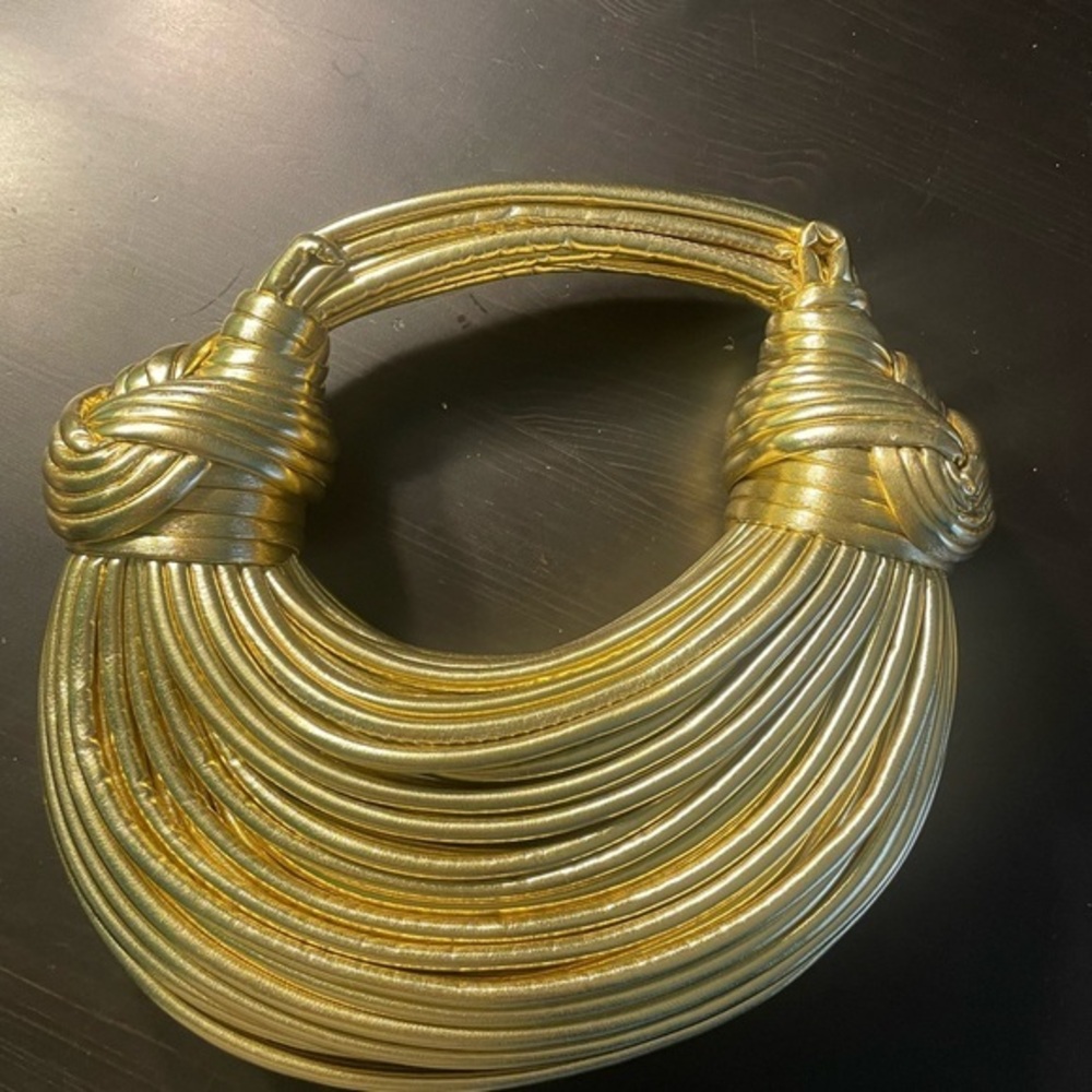 Double knot gold rope bag